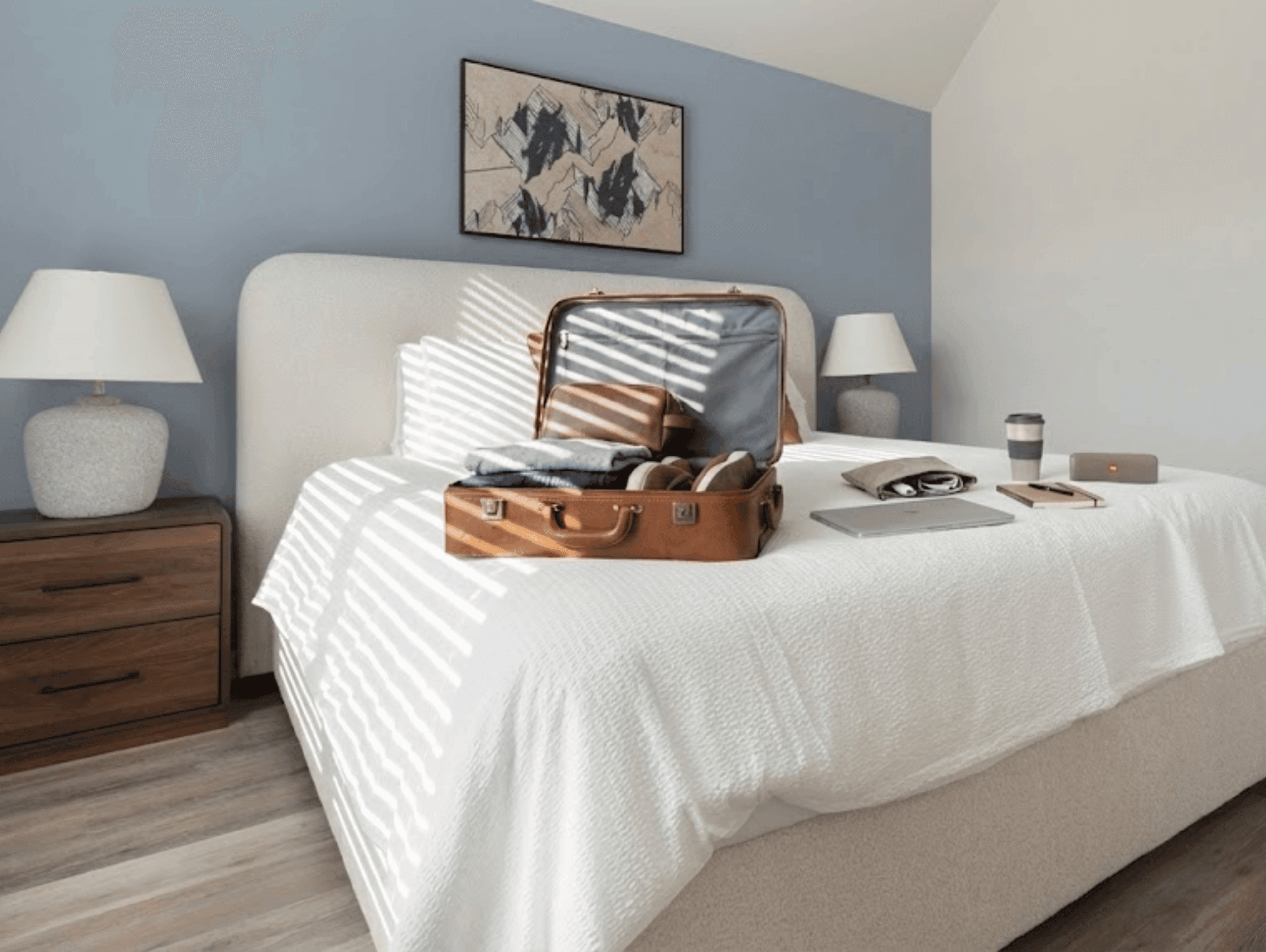 Open suitcase on a bed